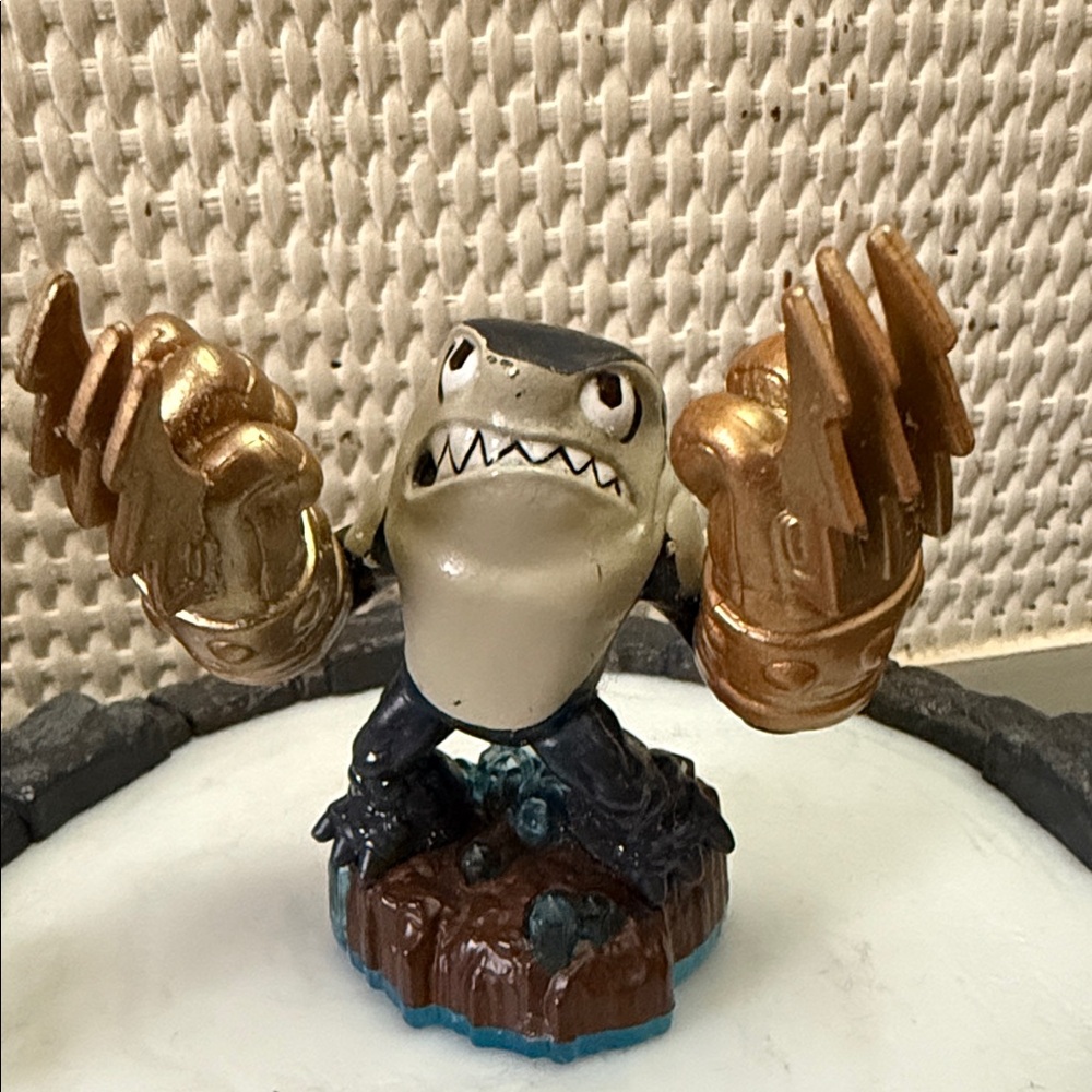Nintendo Figurine with Gold and Black Accents